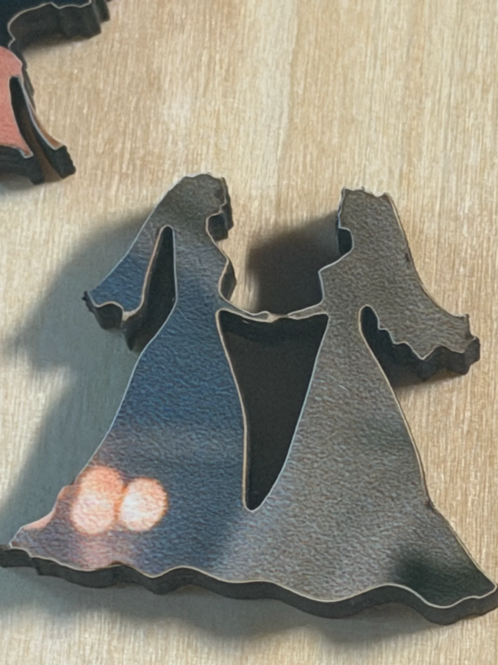 Bride-and-groom story-shaped pieces from an actual Whittled wedding puzzle